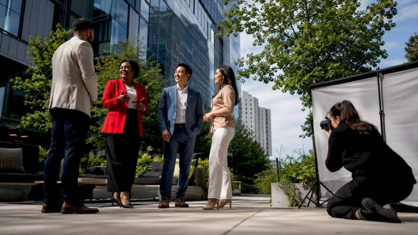 Business leaders preparing for corporate photography session