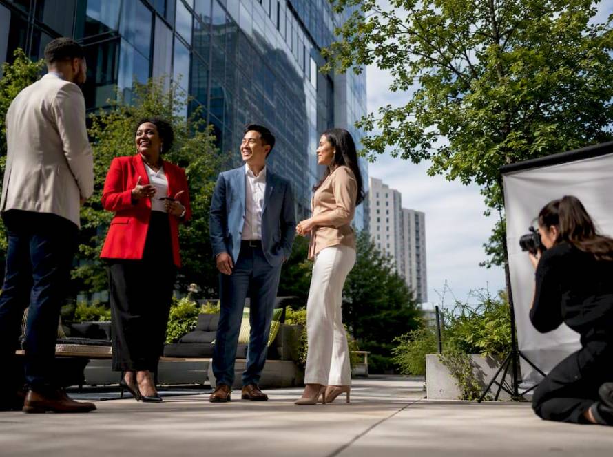 Business leaders preparing for corporate photography session