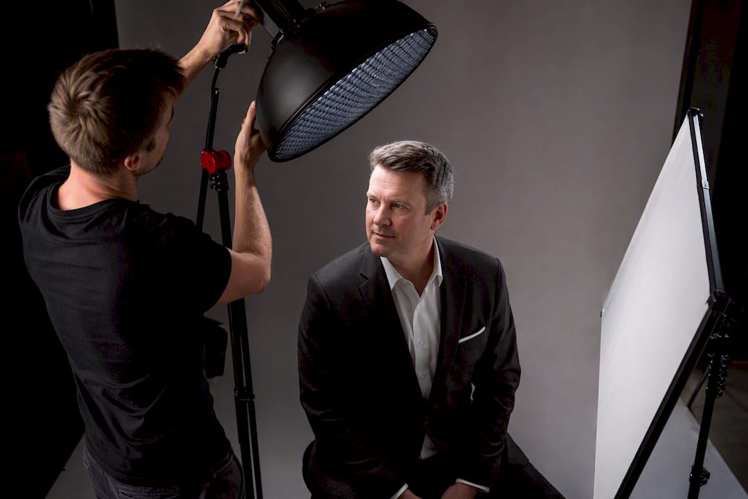 Beauty dish and reflector lighting headshot subject