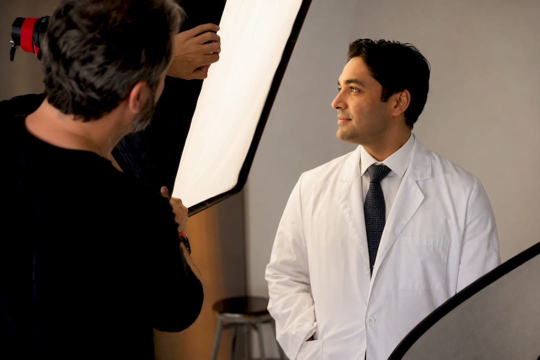 Soft diffused light on white coat portrait